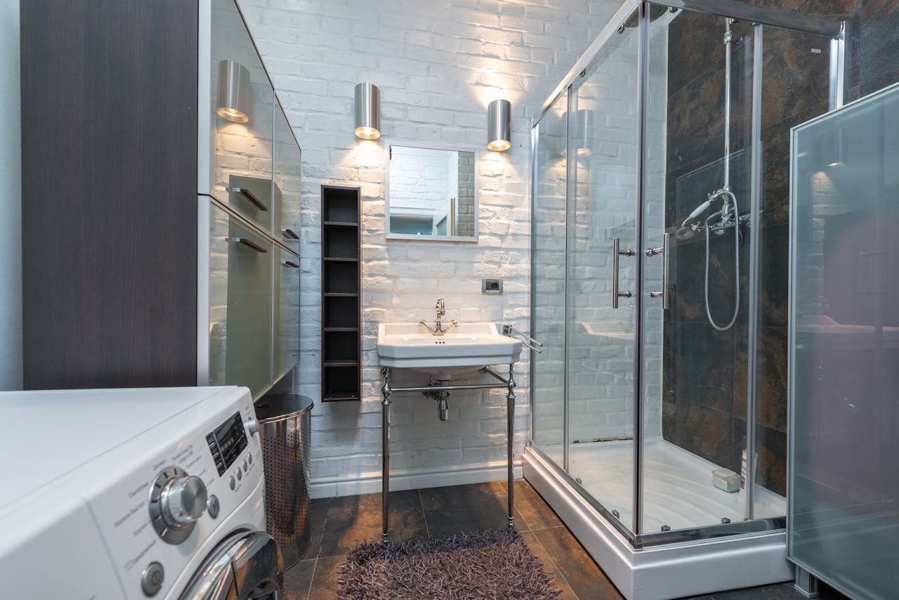 A rental unit utility area with washing machine hookup.